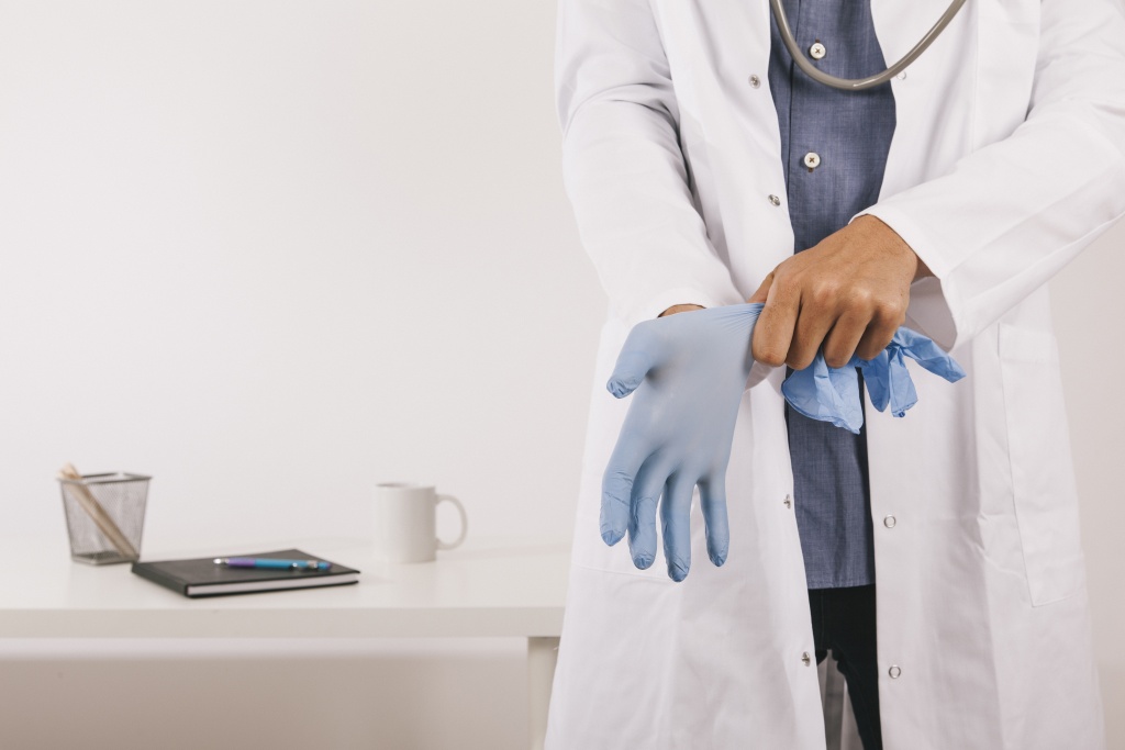 professional-doctor-wearing-gloves-his-office.jpg